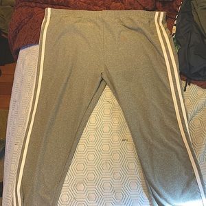 These are gray leggings with a two white lines going down the side